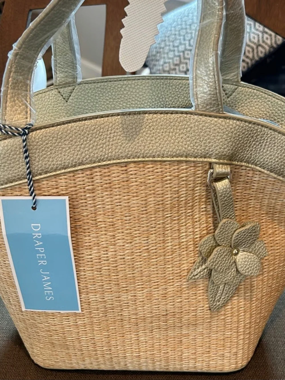 Draper James Natural Straw Tote with Gold Trim and Floral Charm